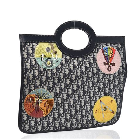 dior fold over clutch